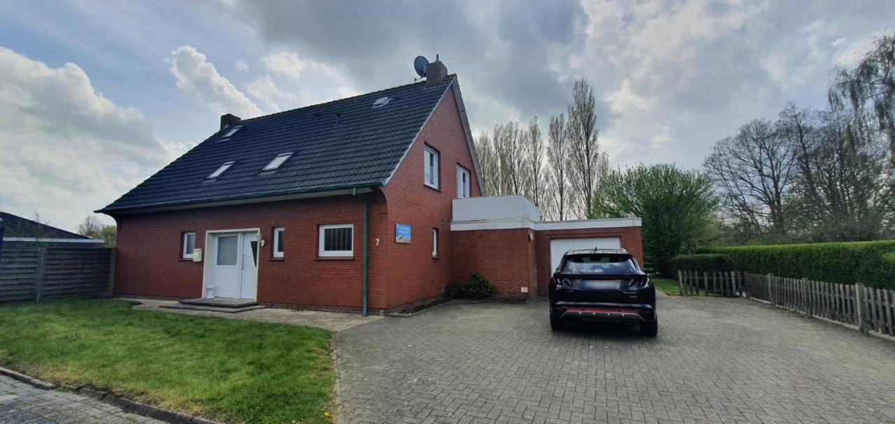 Ferienhaus Am Wellenpark Norddeich Екстериор снимка