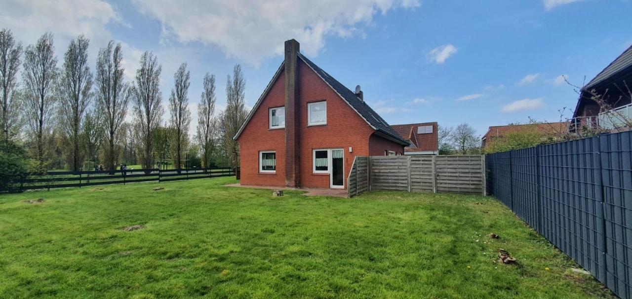 Ferienhaus Am Wellenpark Norddeich Екстериор снимка