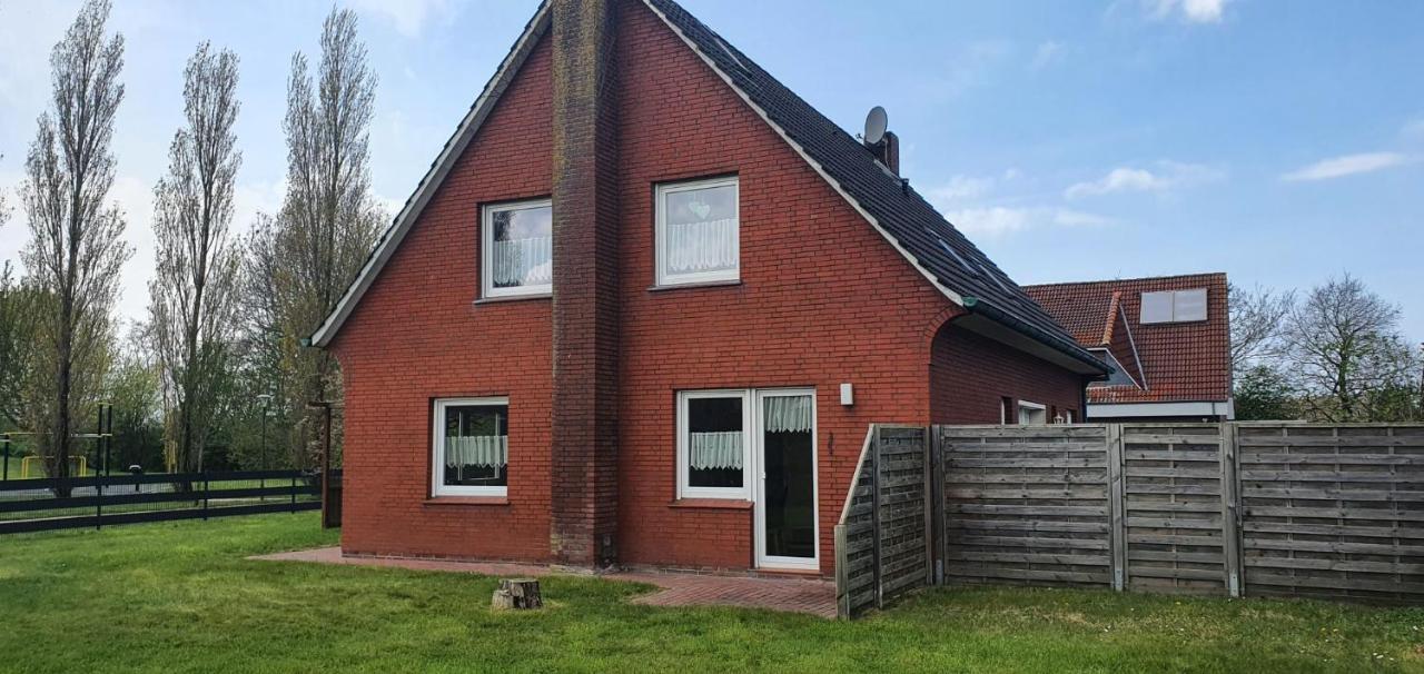 Ferienhaus Am Wellenpark Norddeich Екстериор снимка